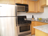 Kitchen with stainless steel GE appliances