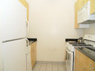 Kitchen with porcelain tile floor and GE appliances